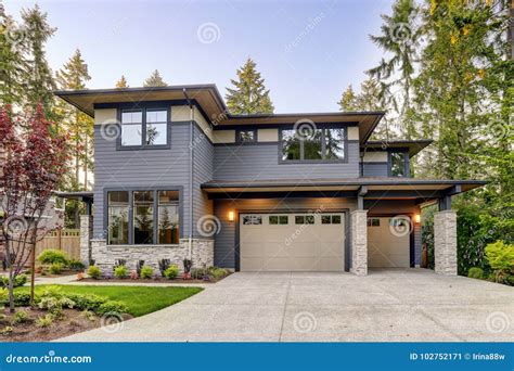 New Construction Home with Wood and Stone Siding Stock Image - Image of ...