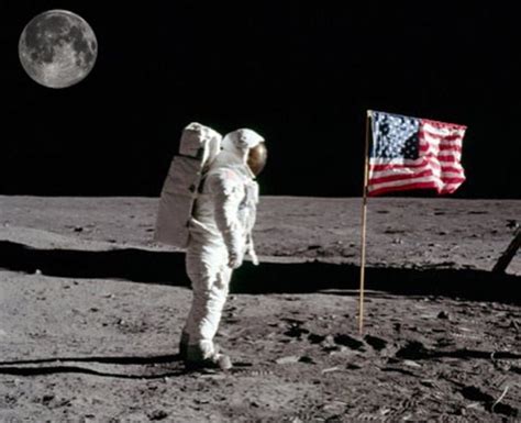 Neil Armstrong stands next to the american flag on the moon (1969) : r ...