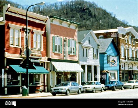 Main Street in small town USA ca. 1980s - Well-maintained early architecture of homes and ...