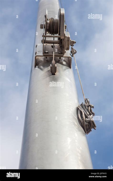 Flag pole pulley hi-res stock photography and images - Alamy