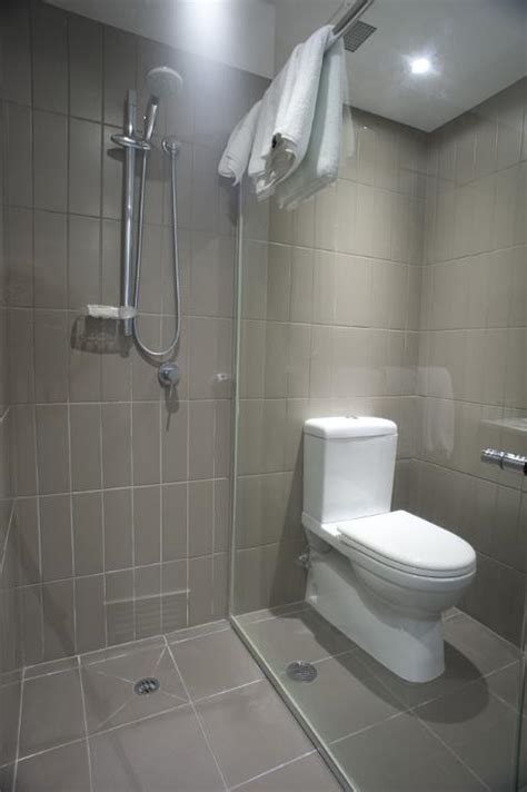 Free Image of Toilet and shower in a small bathroom | Freebie.Photography