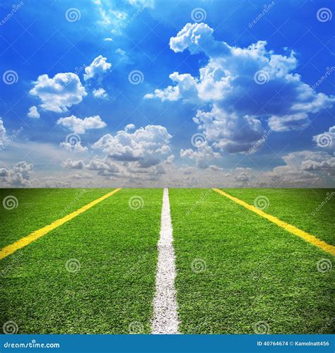 Football and Soccer Field Grass Stadium Blue Sky Background Stock Photo ...