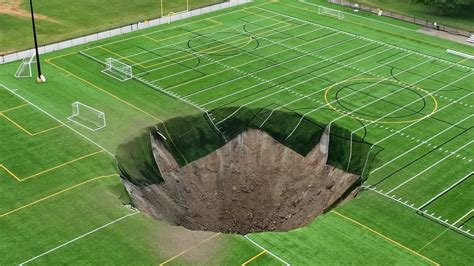 Giant sinkhole swallows center of soccer field in Illinois park: Watch