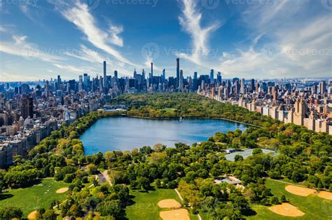 Central Park aerial view in Manhattan, New York. huge beautiful park is surrounded by skyscraper ...