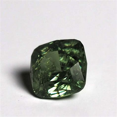 Demantoid garnets sparkle more than diamonds - Edward Fleming Jewellery