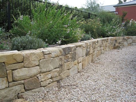 dry stacked with gravel in front | Landscaping | Pinterest | Retaining walls, Exterior design ...