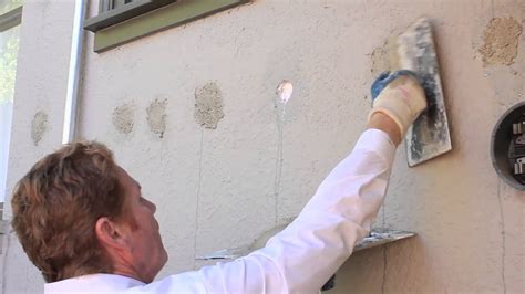 Basic home repairing of exterior insulation holes in stucco walls - YouTube