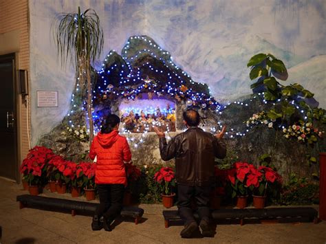 Scenes During Christmas Eve Midnight Mass at a Catholic Church in ...