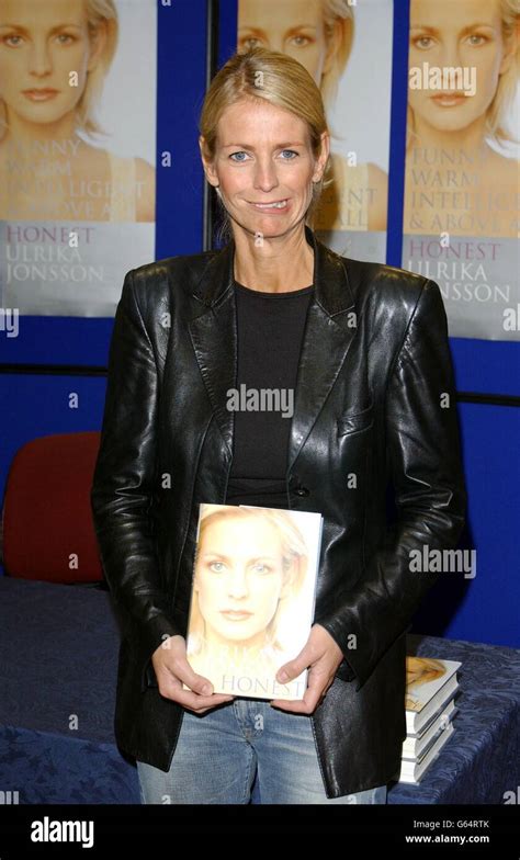 TV presenter Ulrika Jonsson poses for photographers with her autobiography 'Honest' during a ...