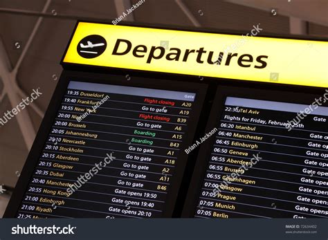 Стоковая фотография 72634402: Airport Flight Information On Large Screen | Shutterstock