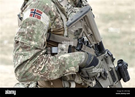 Soldier with assault rifle and flag of Norway on military uniform. Collage Stock Photo - Alamy