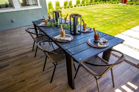Rear Patio Wooden Table with Chairs Stock Image - Image of house, rear: 247644751