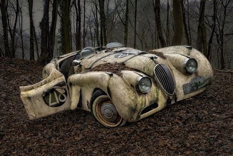 6 Haunting Photographs of Abandoned Vintage Cars Lying in a Forest ...