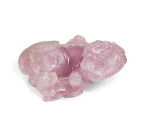 A large rose-quartz buddhist lion and cub group, Qing Dynasty, late ...