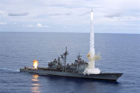 USS Cowpens (CG 63) fires a Standard Missiles (SM) 2 at an airborne drone during a live-fire ...