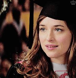 a woman wearing a graduation cap and gown
