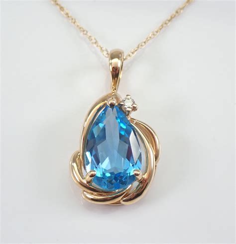 14K Yellow Gold Estate Blue Topaz and Diamond Pendant 18 Chain Necklace December Birthstone