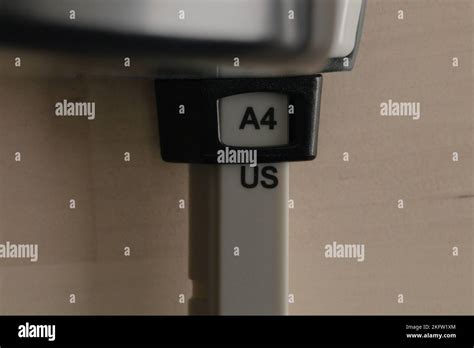 A4 paper size. Paper perforator size Stock Photo - Alamy