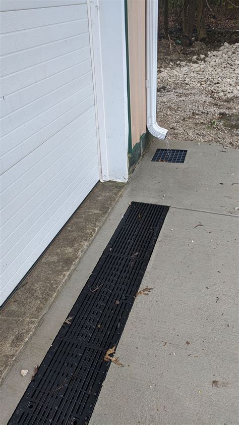 Go-To Garage Drains | Backyard drainage, Front yard landscaping design, Modern front yard