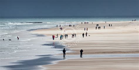 Walking on Bamburgh Beach: Jon Martin Photography