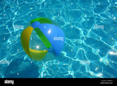 beach ball in the pool Stock Photo - Alamy