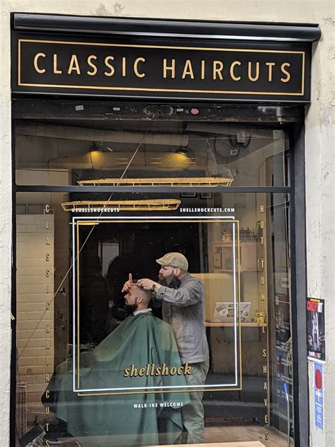 View into a classic barber shop window in Barcelona. That… | Flickr