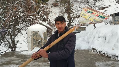 snowfall in ayubia nathiagali heavy snowfall clean in snowfall in house - YouTube