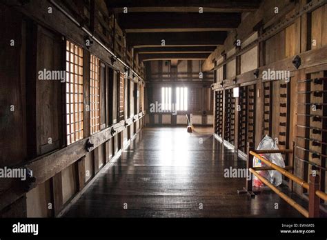 Himeji castle, Japan. Interior of the keep, long open wooden corridor ...