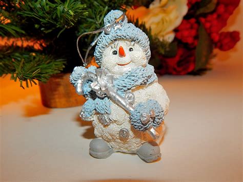 Snowman Christmas Tree Ornament Blue White and Silver Resin Figurine Winter Decoration