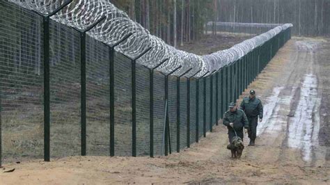 The first 23km of 'anti-migrant' fence is completed on Latvian-Russian border - CGTN