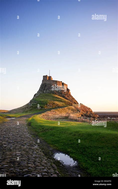 Lindisfarne castle at sunrise hi-res stock photography and images - Alamy