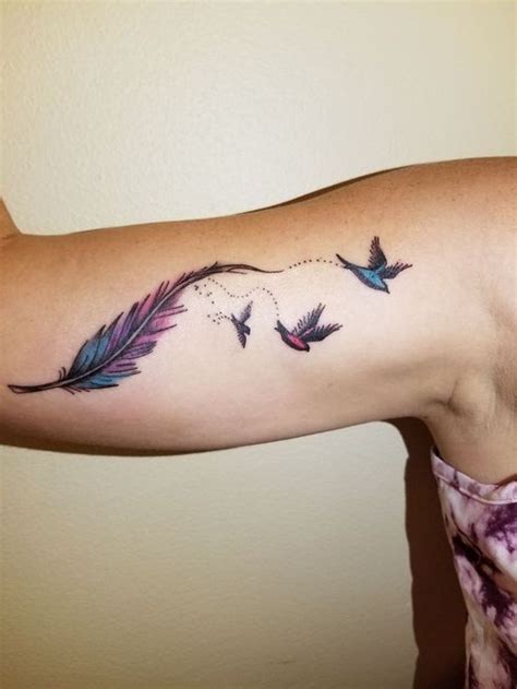 34 Stunning Feather Tattoo Ideas - Fashionmoe | Feather tattoo design, Feather with birds tattoo ...