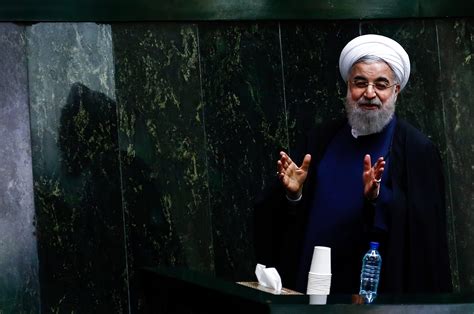 Iranian President Hassan Rouhani attends the parliament session ...