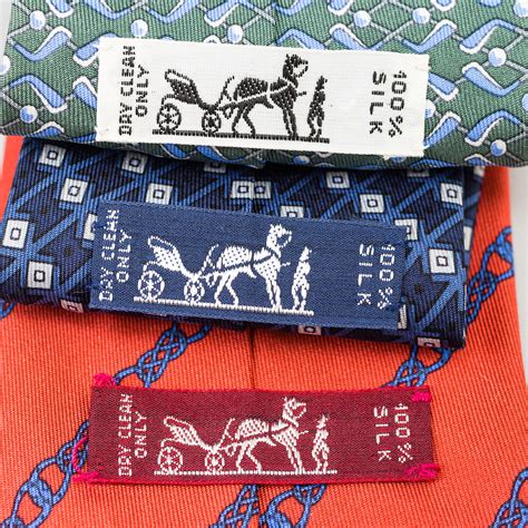 Three silk ties from Hermès. - Bukowskis