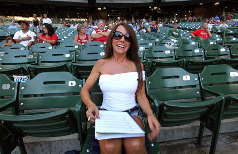 Front Row Amy is the center of attention at Brewers games