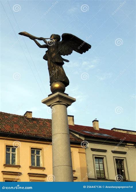 Angel Of Uzupis, Statue Of An Angel Blowing A Trumpet. Uzupis Neighborhood In Vilnius's Old Town ...