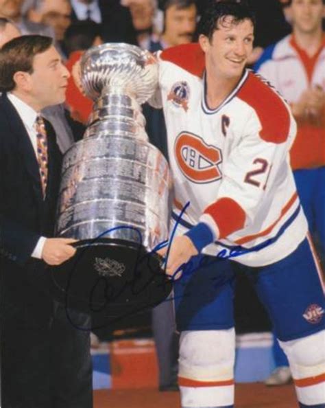 Montreal Canadiens Guy Carbonneau accepts The Stanley Cup from Gary ...