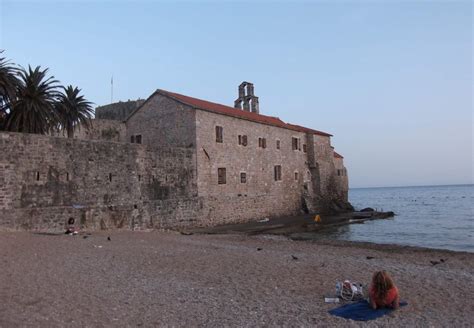 Solve Budva old town beach at dusk jigsaw puzzle online with 35 pieces