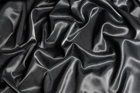 Premium Photo | Black silk fabric background