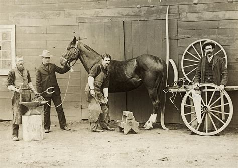 Farrier Shoeing A Horse Photograph by Underwood Archives | Pixels