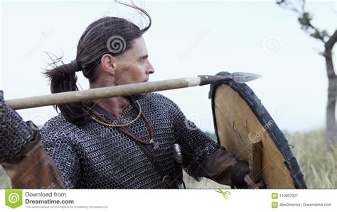 A Viking Warrior Throws a Spear during an Attack. Stock Image - Image ...