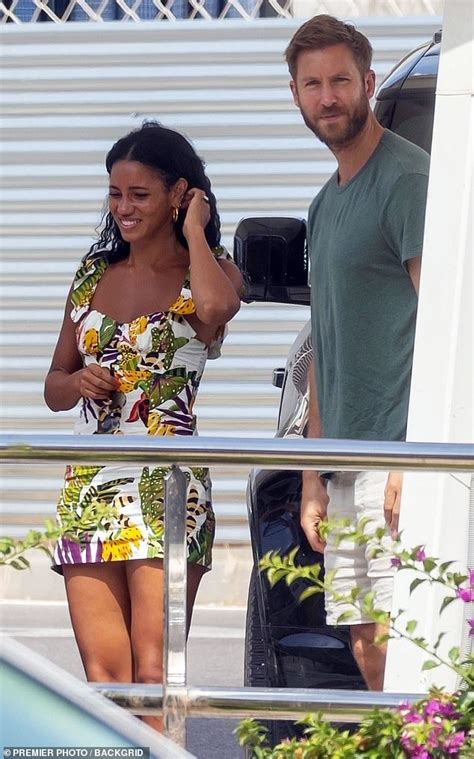 Vick Hope wows in a summery mini as she steps out with fiancé Calvin Harris and her parents in ...