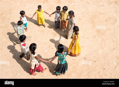 Indian village children in a circle holding hands playing games Stock ...