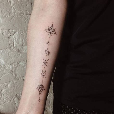 Hand poked symbols, including Virgo Zodiac sign and Mercury planet ...