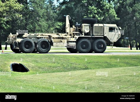 Soldiers operate an M1120 Heavy Expanded Mobility Tactical Truck (Load ...