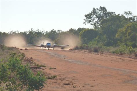 plane landing on airstrip