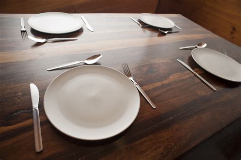 Free Stock Photo 8842 Wooden dining table with four place settings | freeimageslive