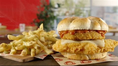 Wendy's Debuts New Cheesy Chicken Sandwich And Garlic Fries - Tasting ...