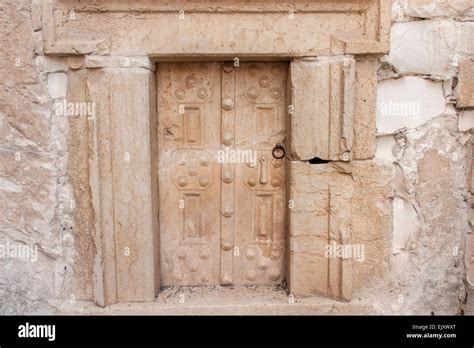 Israel. An ancient stone door in the 2000-years old Jewish necropolis at Beit Shearim, UNESCO ...