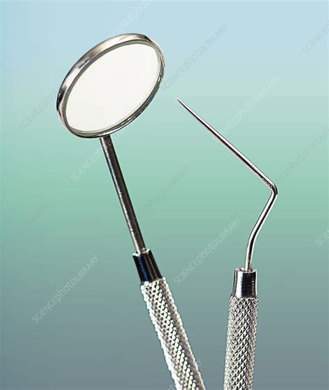 Dental Mirror & Probe - Stock Image - C039/0942 - Science Photo Library
